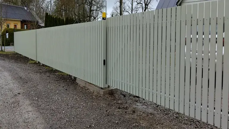 White wooden picket fence