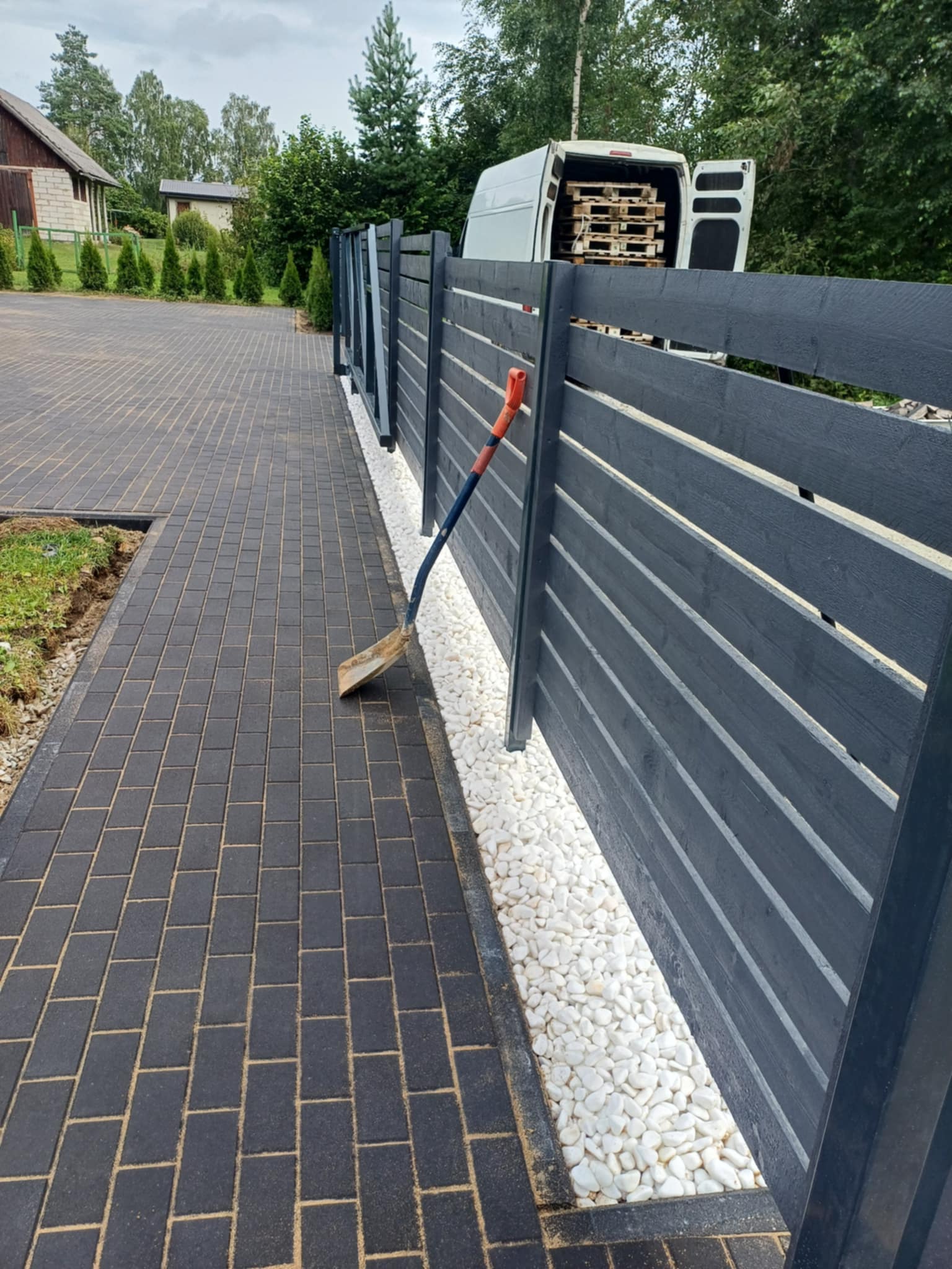 Finished paved driveway with edging stones