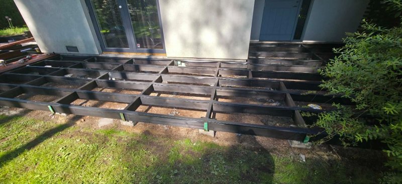 Terrace subframe with protective joist tape